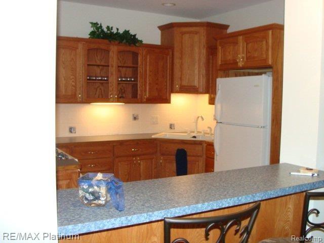 7193 Summit Ridge Brighton, MI 48116 - Photo 4 of 25 KITCHEN IN BASEMENT