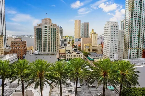 a view of a city with tall buildings