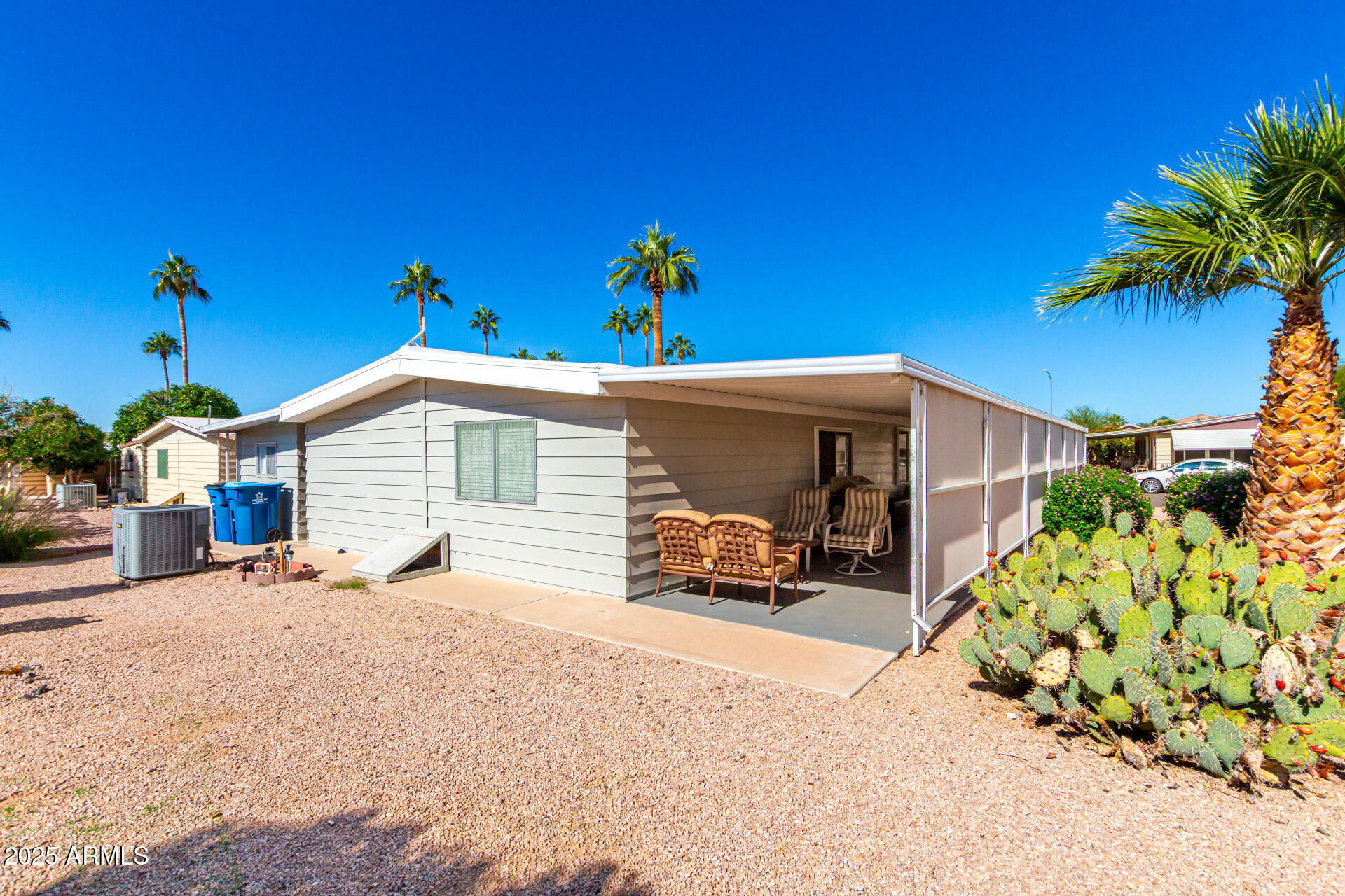 661 South Hawes Road, Unit 52 Mesa, AZ 85208 - Photo 14 of 36 a view of a house with a yard