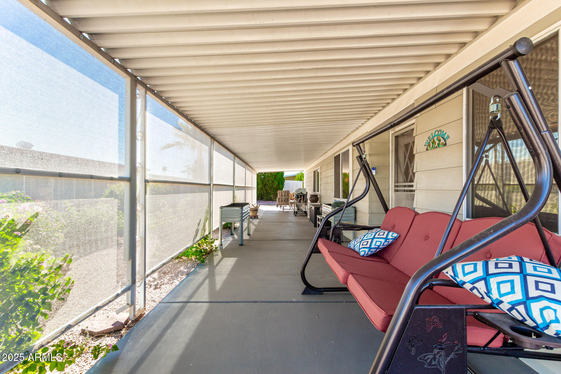 661 South Hawes Road, Unit 52 Mesa, AZ 85208 - Photo 24 of 36 a outdoor space with seating