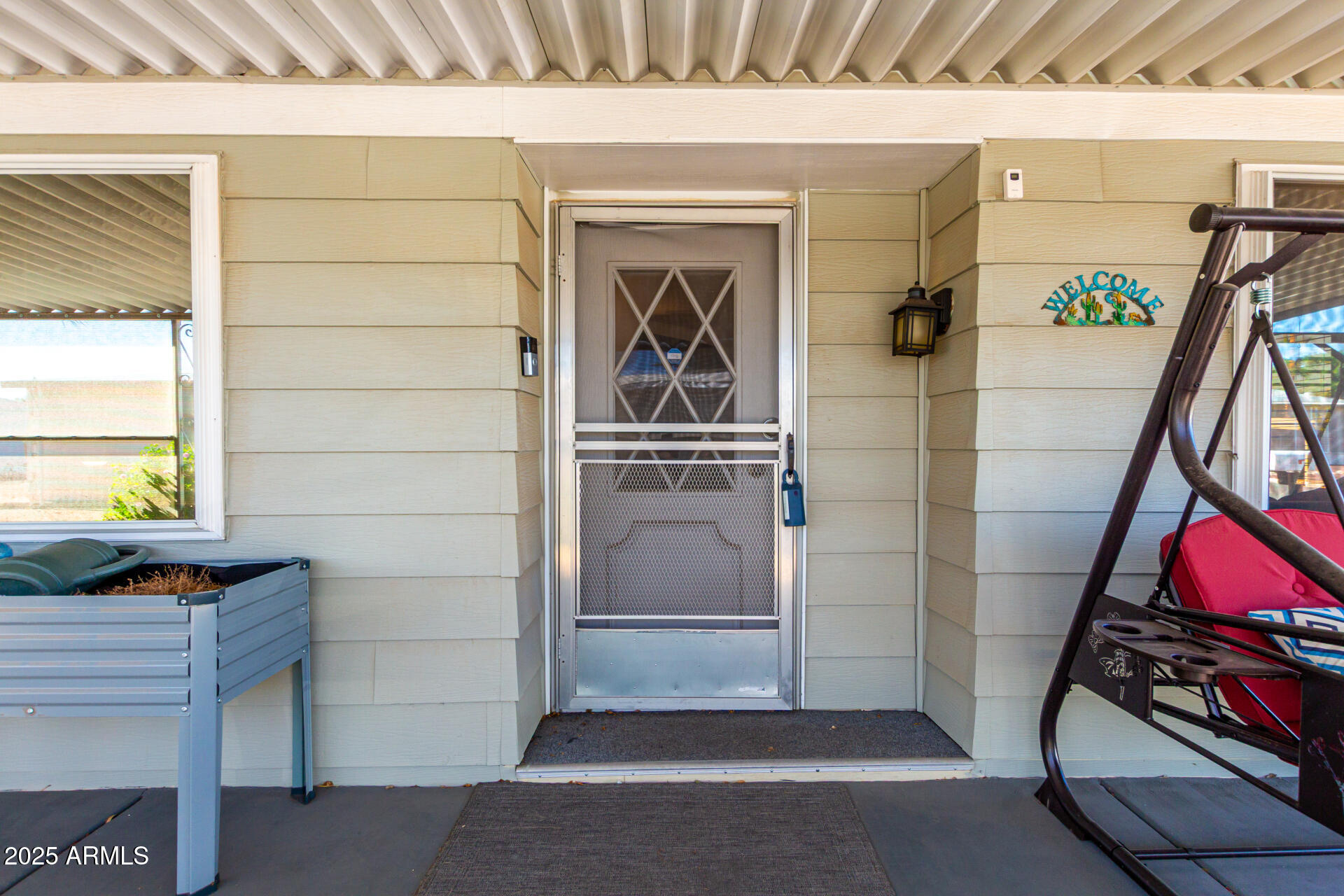 661 South Hawes Road, Unit 52 Mesa, AZ 85208 - Photo 25 of 36 a view of an entryway with a window