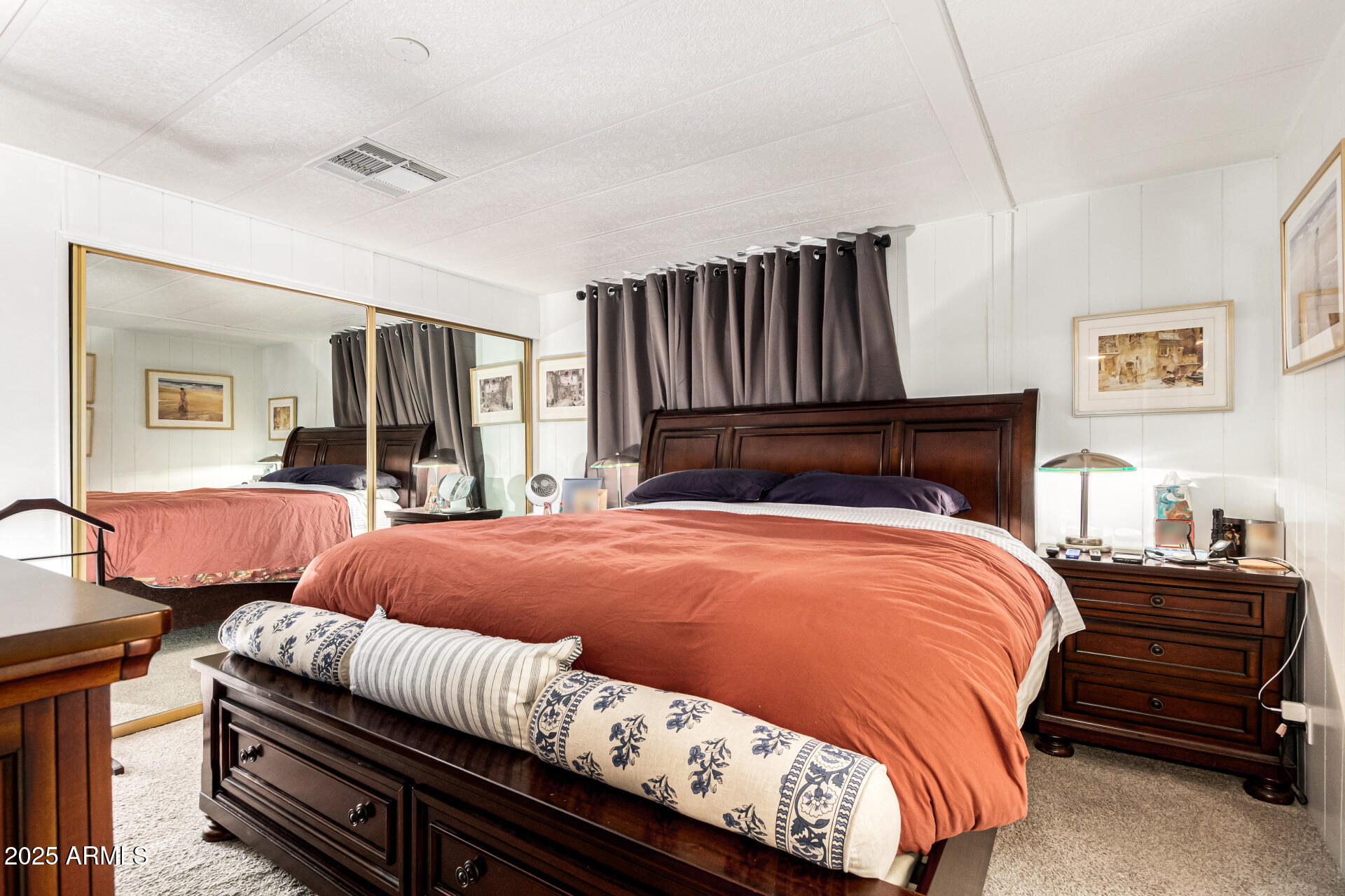 661 South Hawes Road, Unit 52 Mesa, AZ 85208 - Photo 28 of 36 a bedroom with bed and wooden floor