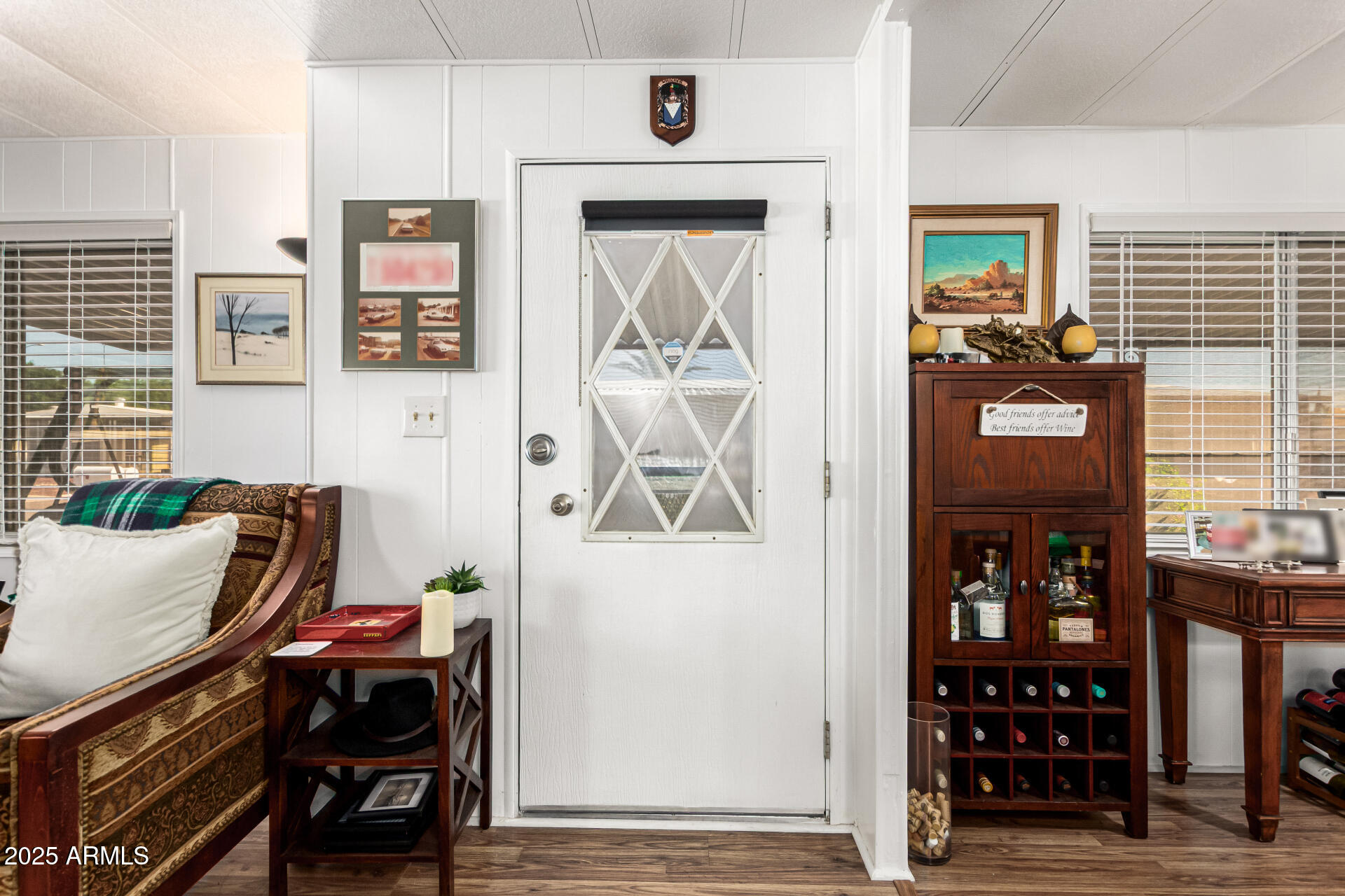 661 South Hawes Road, Unit 52 Mesa, AZ 85208 - Photo 35 of 36 a view of a livingroom with furniture and window