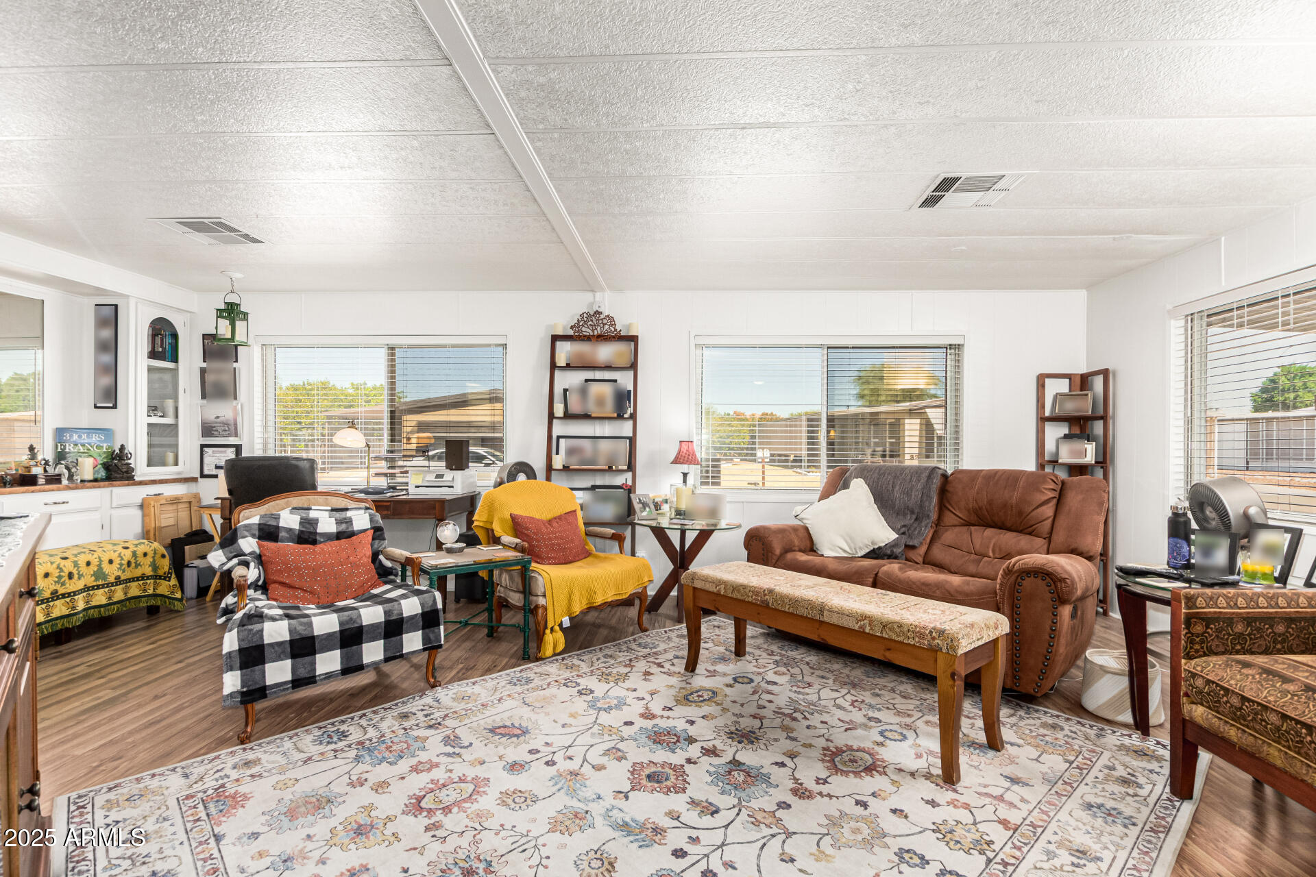 661 South Hawes Road, Unit 52 Mesa, AZ 85208 - Photo 10 of 36 a living room with furniture and a large window