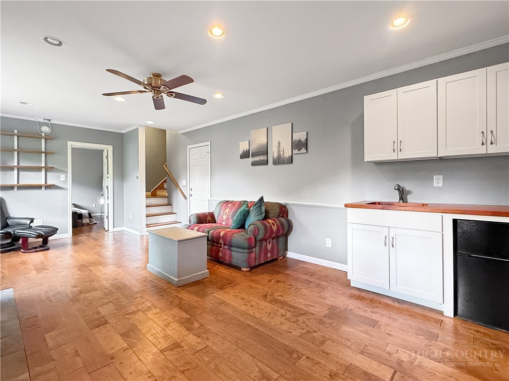 1173 Hopewell Church Road Boone, NC 28607 - Photo 22 of 39 a living room with furniture and kitchen view