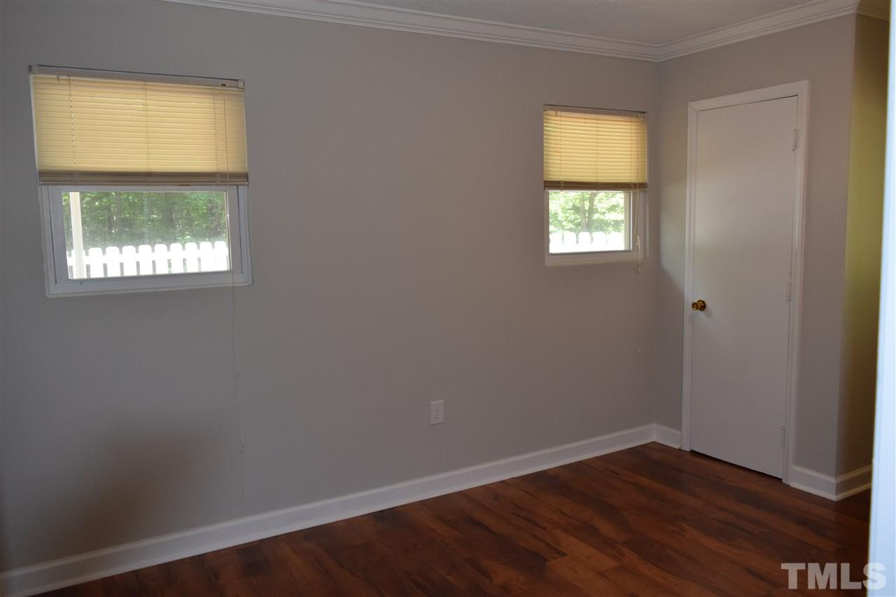 89 Mountain Ridge Road Rougemont, NC 27572 - Photo 15 of 16 an empty room with a window