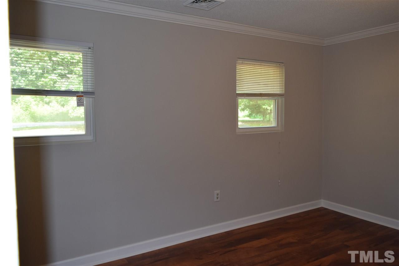 89 Mountain Ridge Road Rougemont, NC 27572 - Photo 16 of 16 an empty room with a window