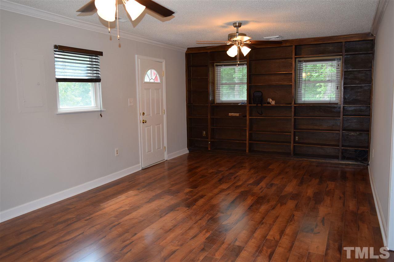 89 Mountain Ridge Road Rougemont, NC 27572 - Photo 8 of 16 wooden floor in an empty room with a window