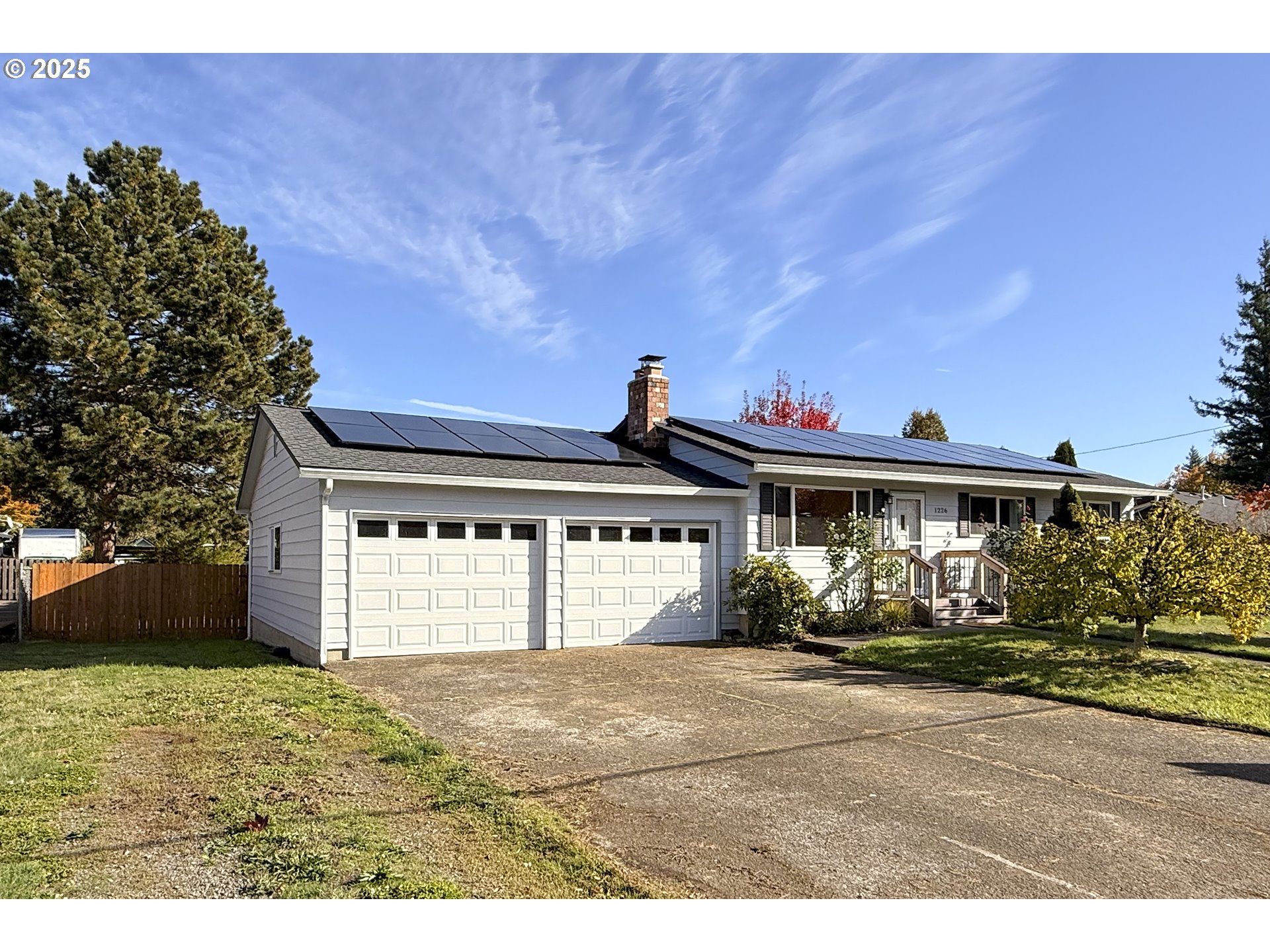 1226 Southwest Hensley Road Troutdale, OR 97060 - Photo 3 of 40 a front view of a house with a yard