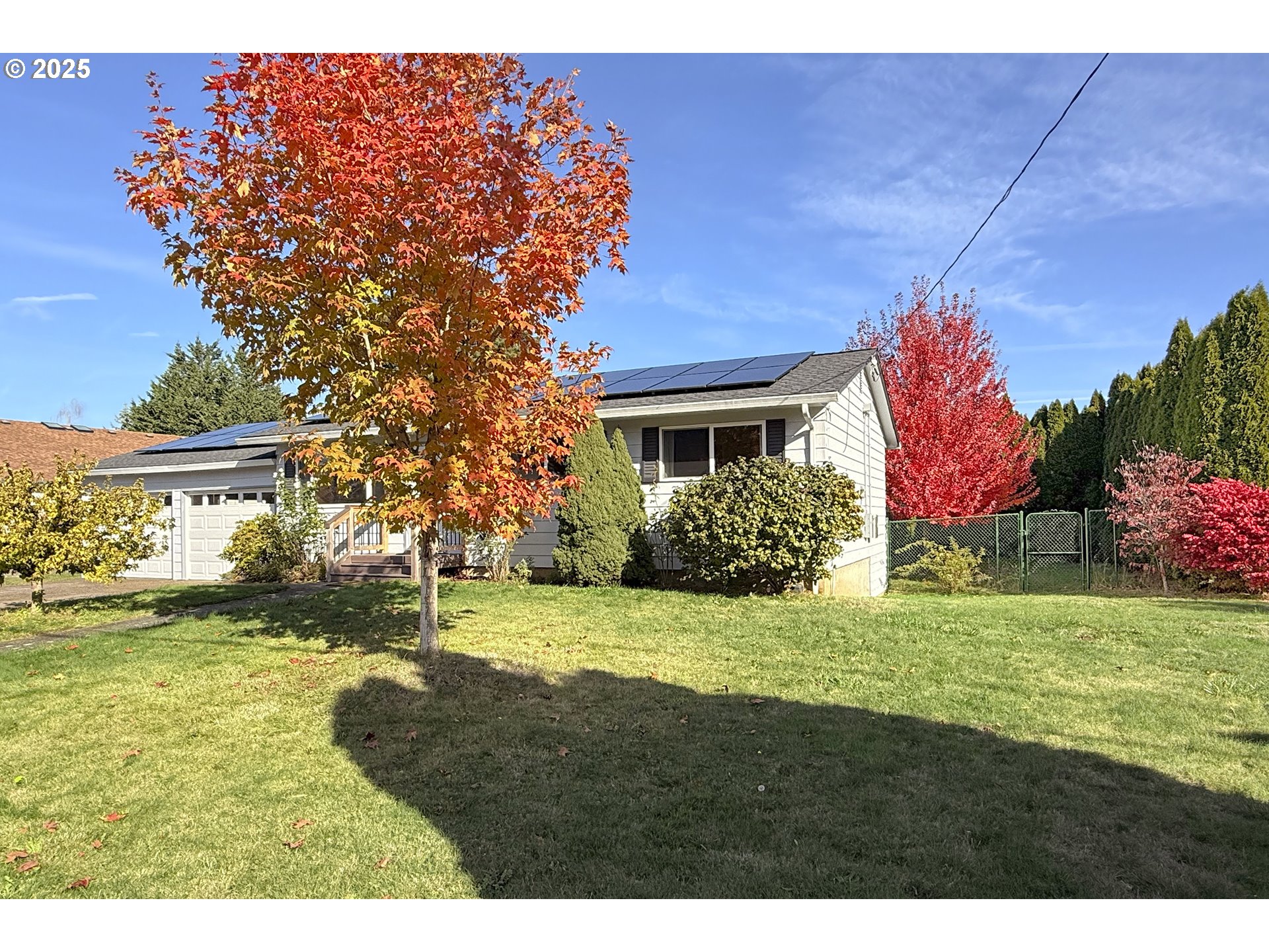 1226 Southwest Hensley Road Troutdale, OR 97060 - Photo 5 of 40 a backyard of a house with a yard and outdoor seating