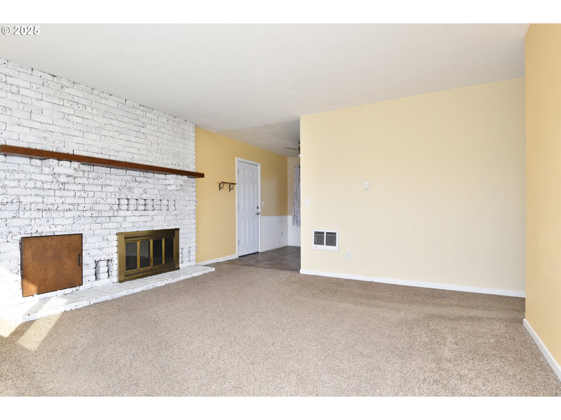 1226 Southwest Hensley Road Troutdale, OR 97060 - Photo 7 of 40 a view of empty room with a fireplace