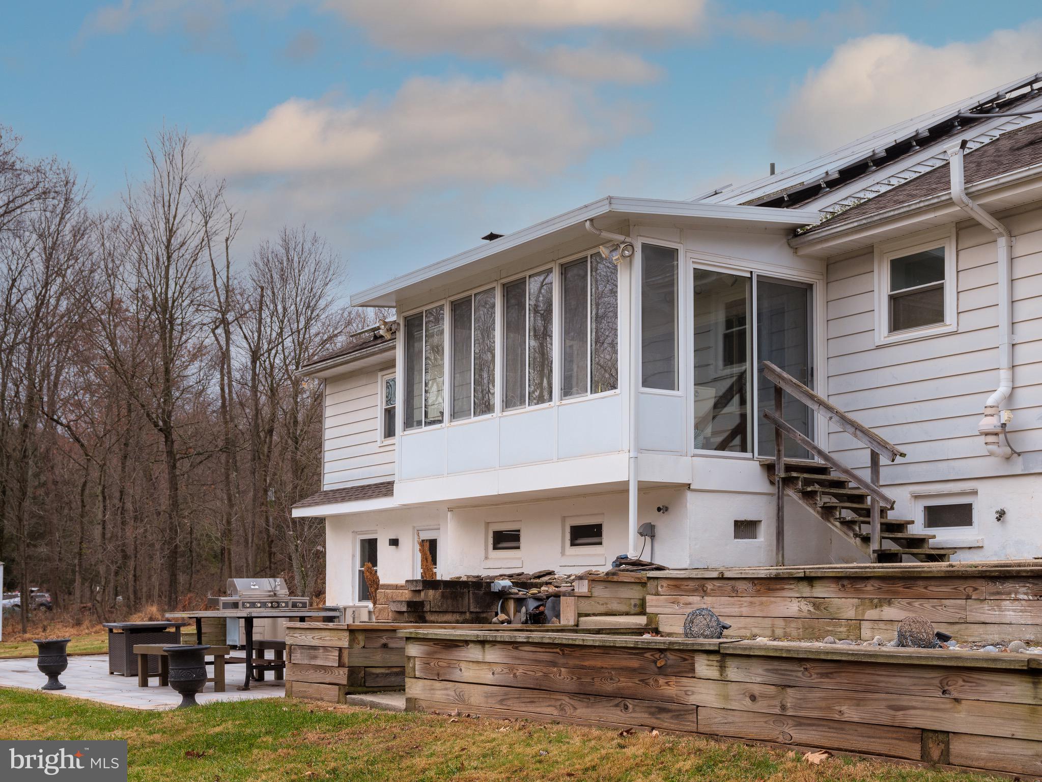 21 Thompson Mill Road Newtown, PA 18940 - Photo 38 of 44 Door tot the sunroom