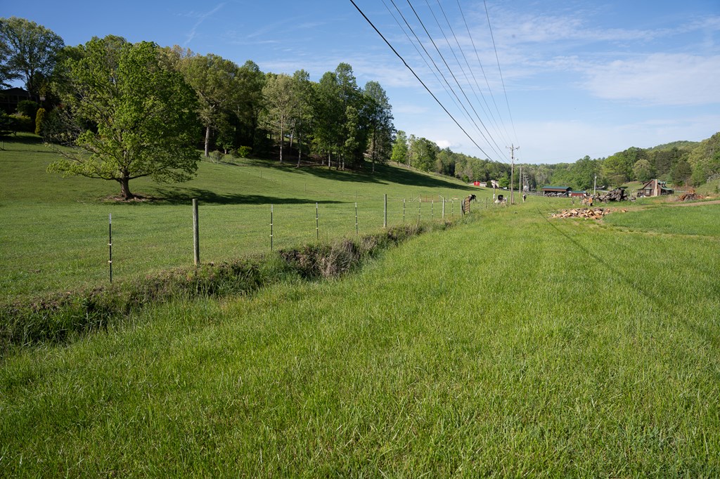 564 Wright Road Murphy, NC 28906 - Photo 21 of 36 a view of a field of grass and trees