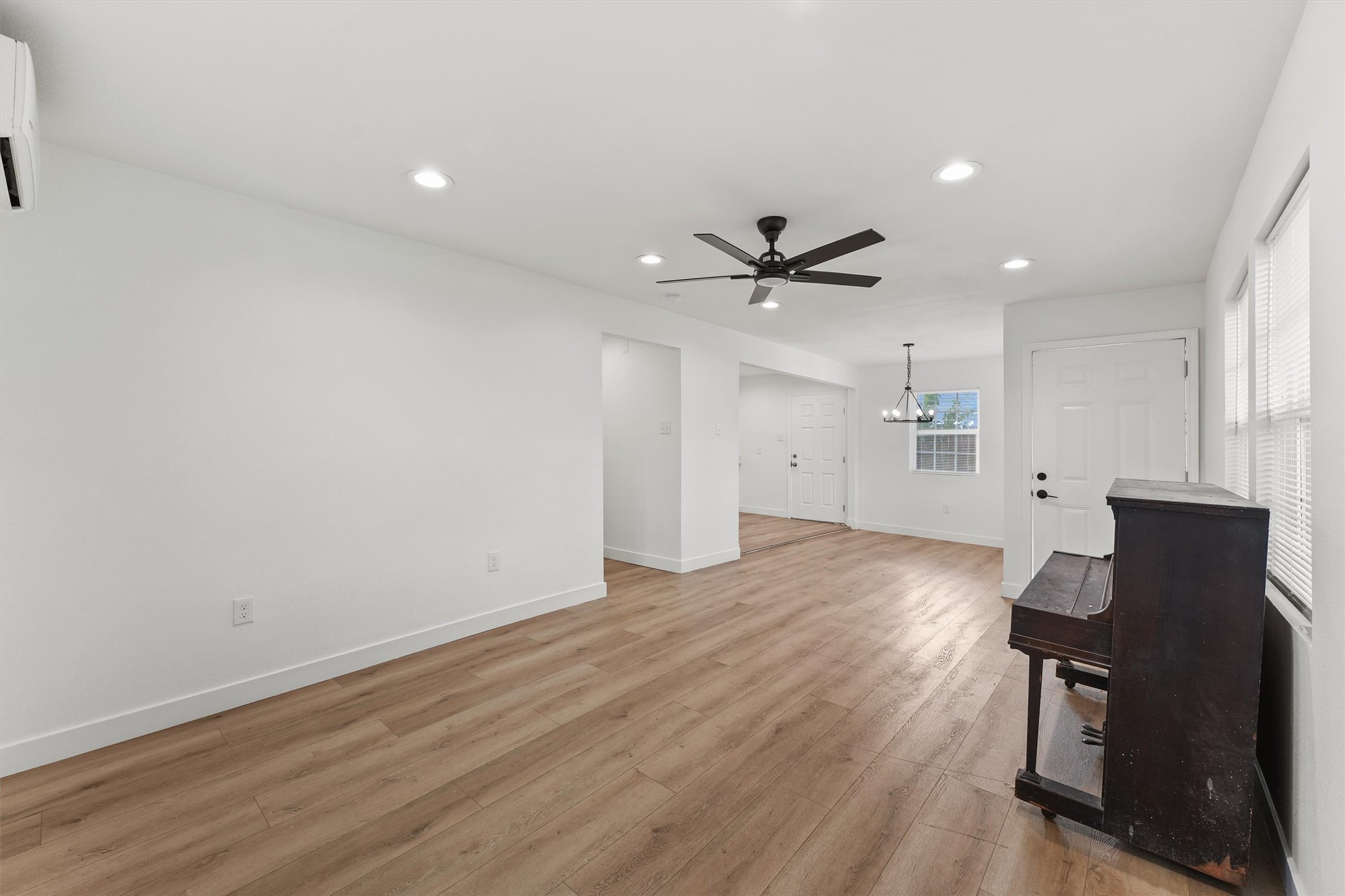 5406 Firefly Street Houston, TX 77017 - Photo 11 of 29 wooden floor in an empty room with a workspace
