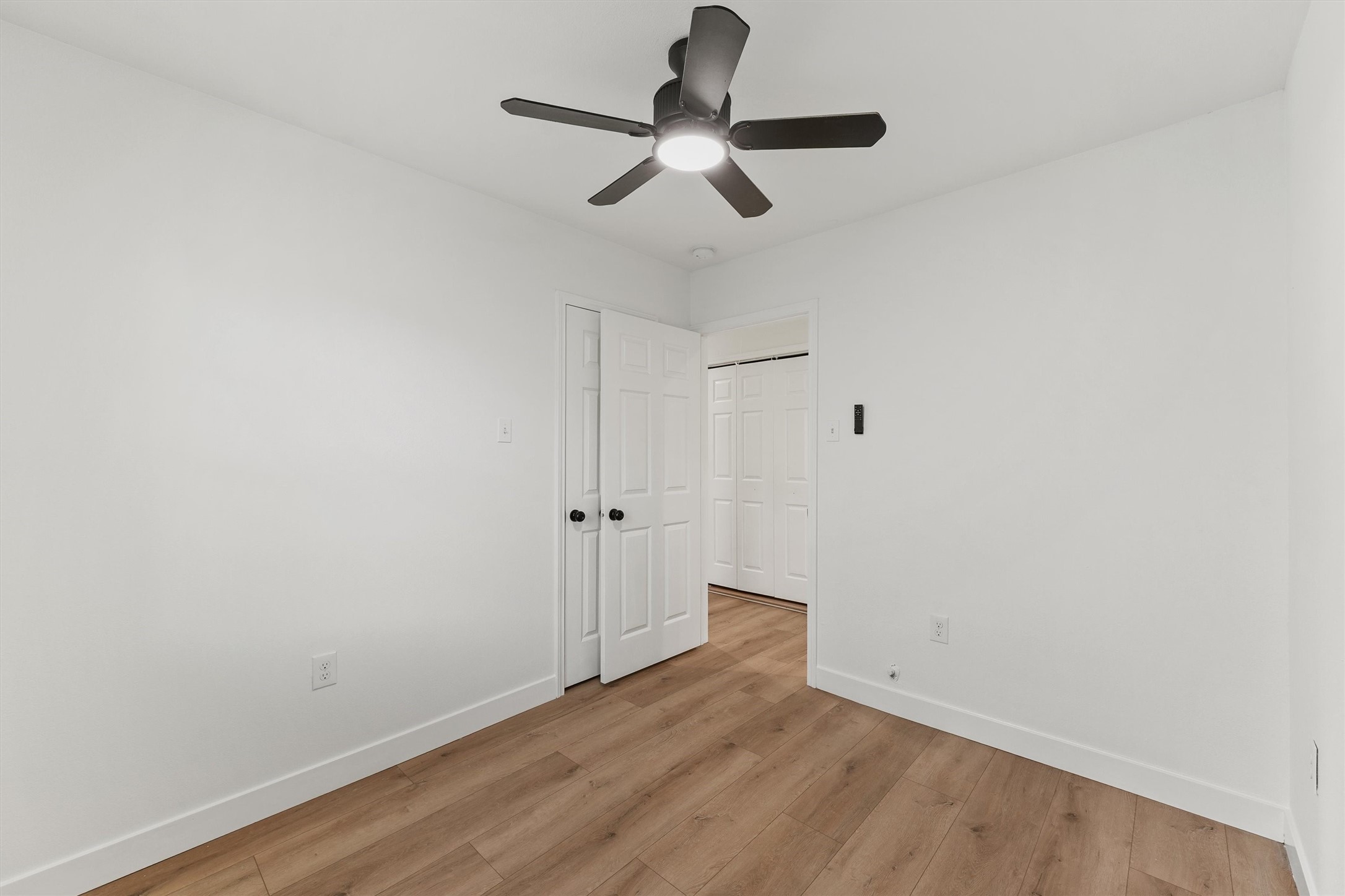 5406 Firefly Street Houston, TX 77017 - Photo 13 of 29 a view of room with hardwood floor