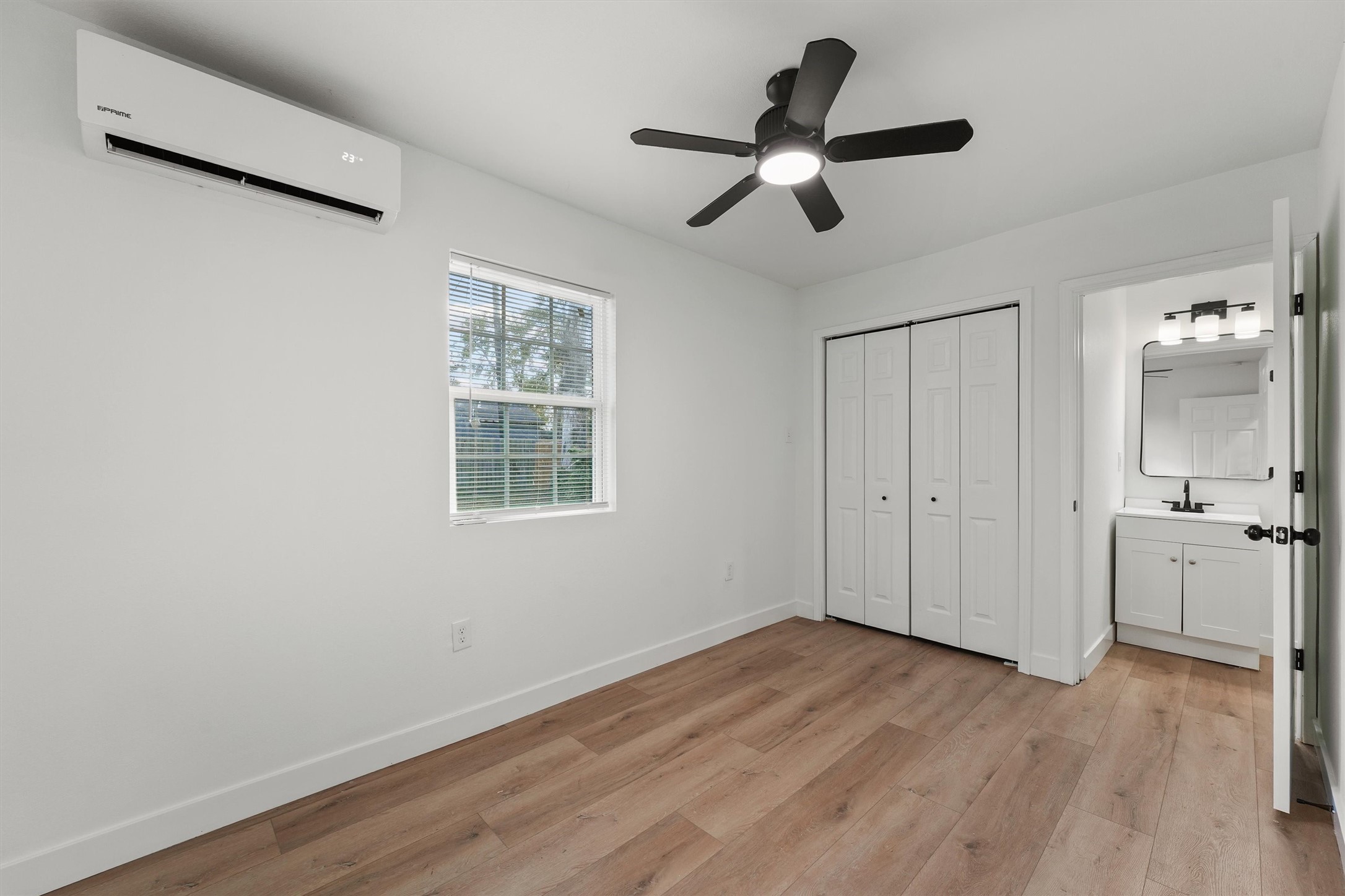 5406 Firefly Street Houston, TX 77017 - Photo 19 of 29 wooden floor in an empty room with a window