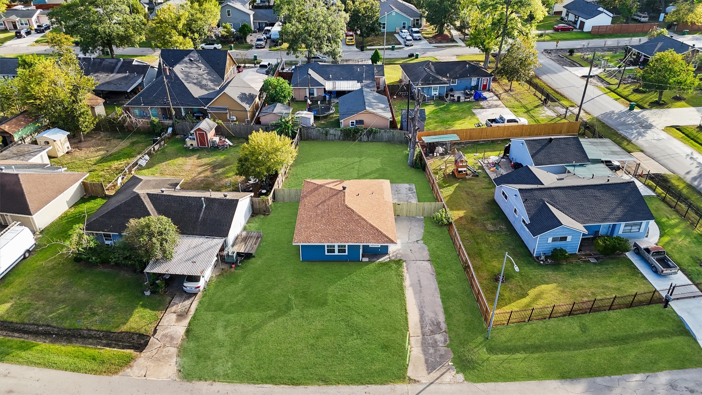 5406 Firefly Street Houston, TX 77017 - Photo 25 of 29 an aerial view of multiple houses with yard