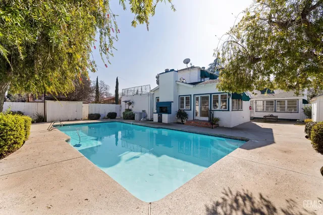 a view of a house with a swimming pool