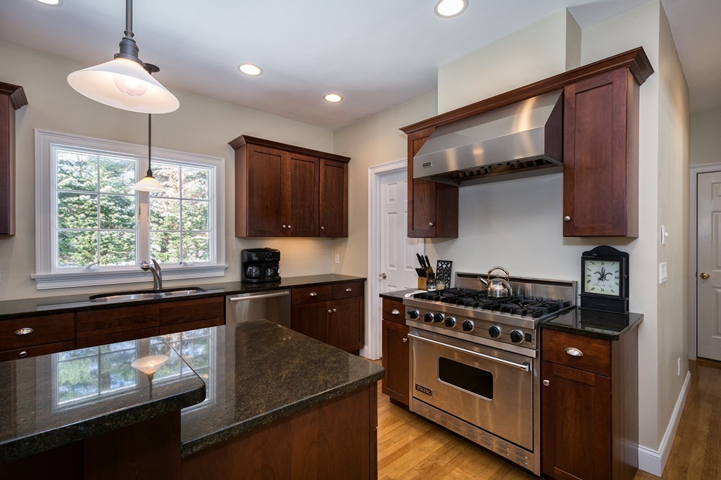 20 Beech Tree Farm Road Scituate, MA 02066 - Photo 10 of 29 a kitchen with stainless steel appliances granite countertop a stove a sink and a microwave
