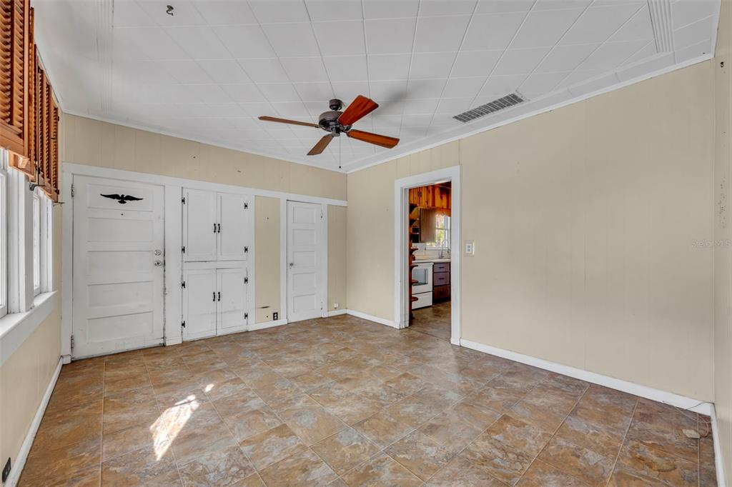 207 Perkins Street Leesburg, FL 34748 - Photo 16 of 31 a view of empty room with ceiling fan