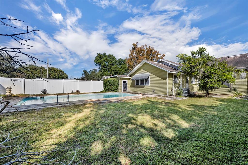 207 Perkins Street Leesburg, FL 34748 - Photo 21 of 31 a view of a house with a yard