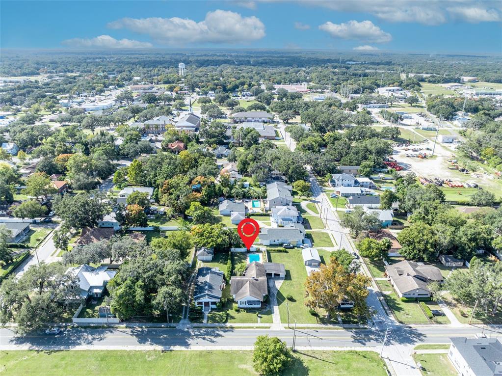 207 Perkins Street Leesburg, FL 34748 - Photo 29 of 31 an aerial view of residential building and lake