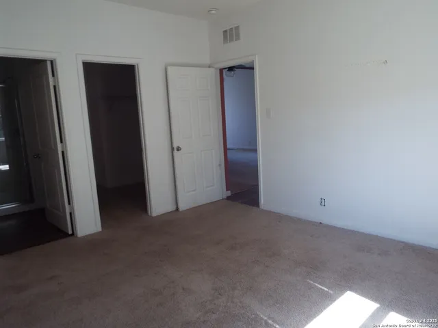 an empty room with closet