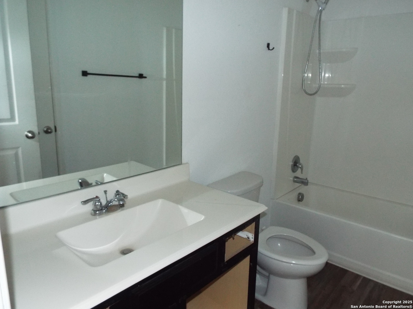 4937 Hallies Garden St. Hedwig, TX 78152 - Photo 19 of 30 a bathroom with a sink toilet and shower