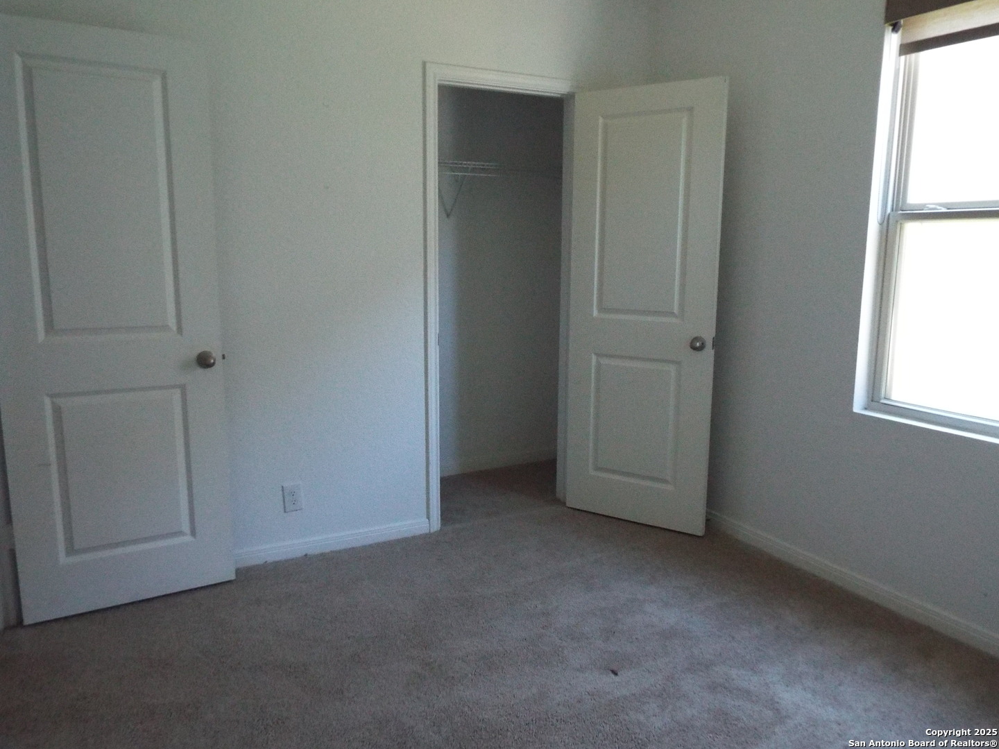 4937 Hallies Garden St. Hedwig, TX 78152 - Photo 22 of 30 an empty room with windows