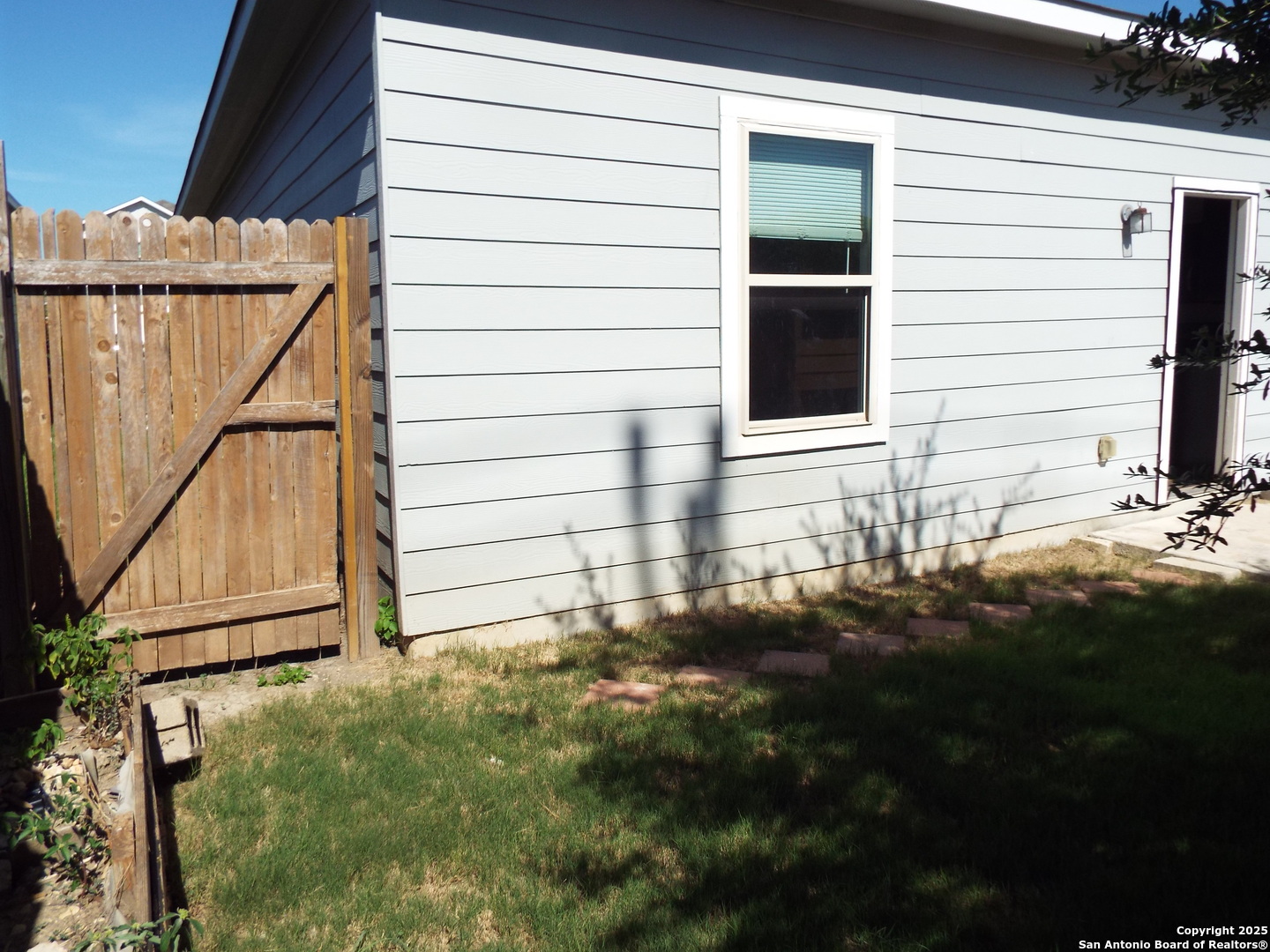 4937 Hallies Garden St. Hedwig, TX 78152 - Photo 30 of 30 a view of house with backyard