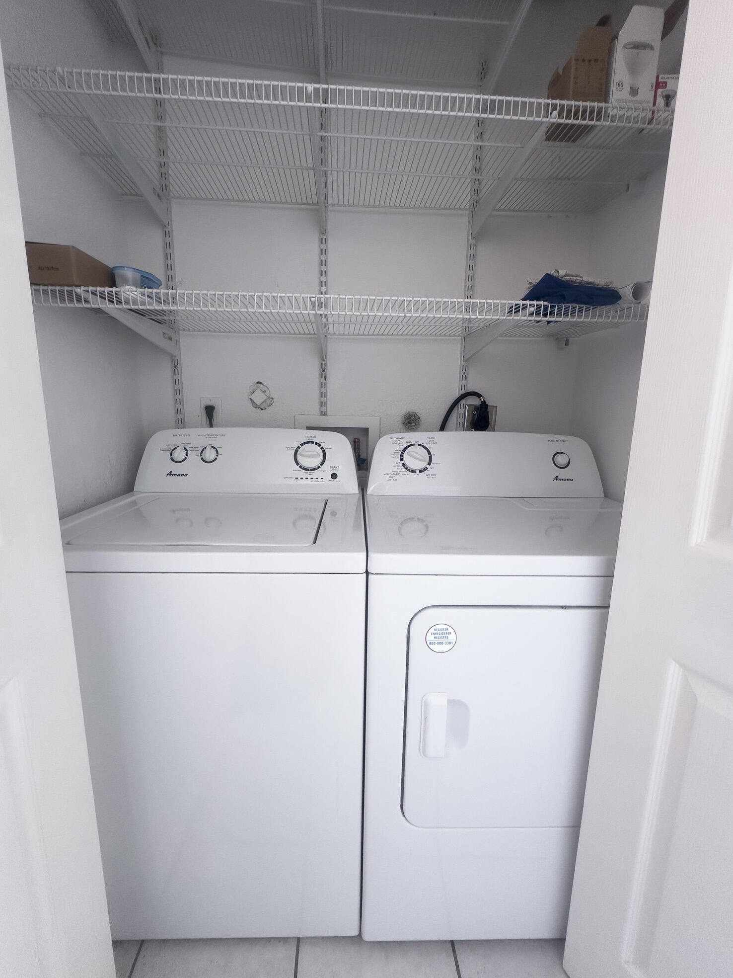3130 Southwest 20th Terrace, Unit 13B1 Delray Beach, FL 33445 - Photo 11 of 47 a utility room with dryer and washer