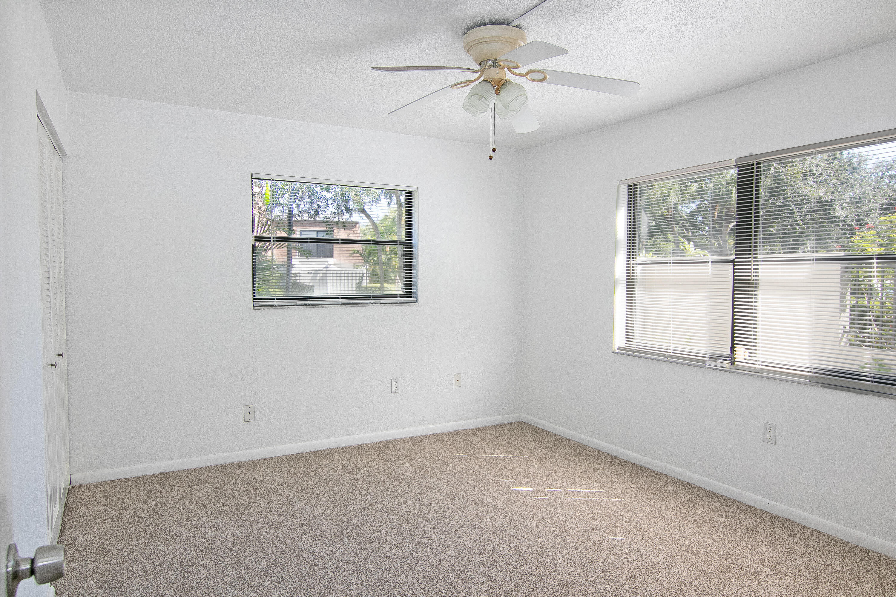 3130 Southwest 20th Terrace, Unit 13B1 Delray Beach, FL 33445 - Photo 29 of 47 an empty room with a window