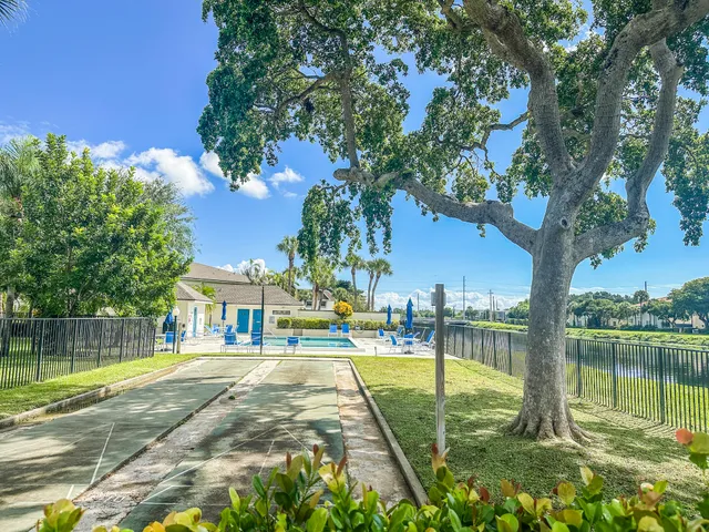 a kitchen with a refrigerator and countertop