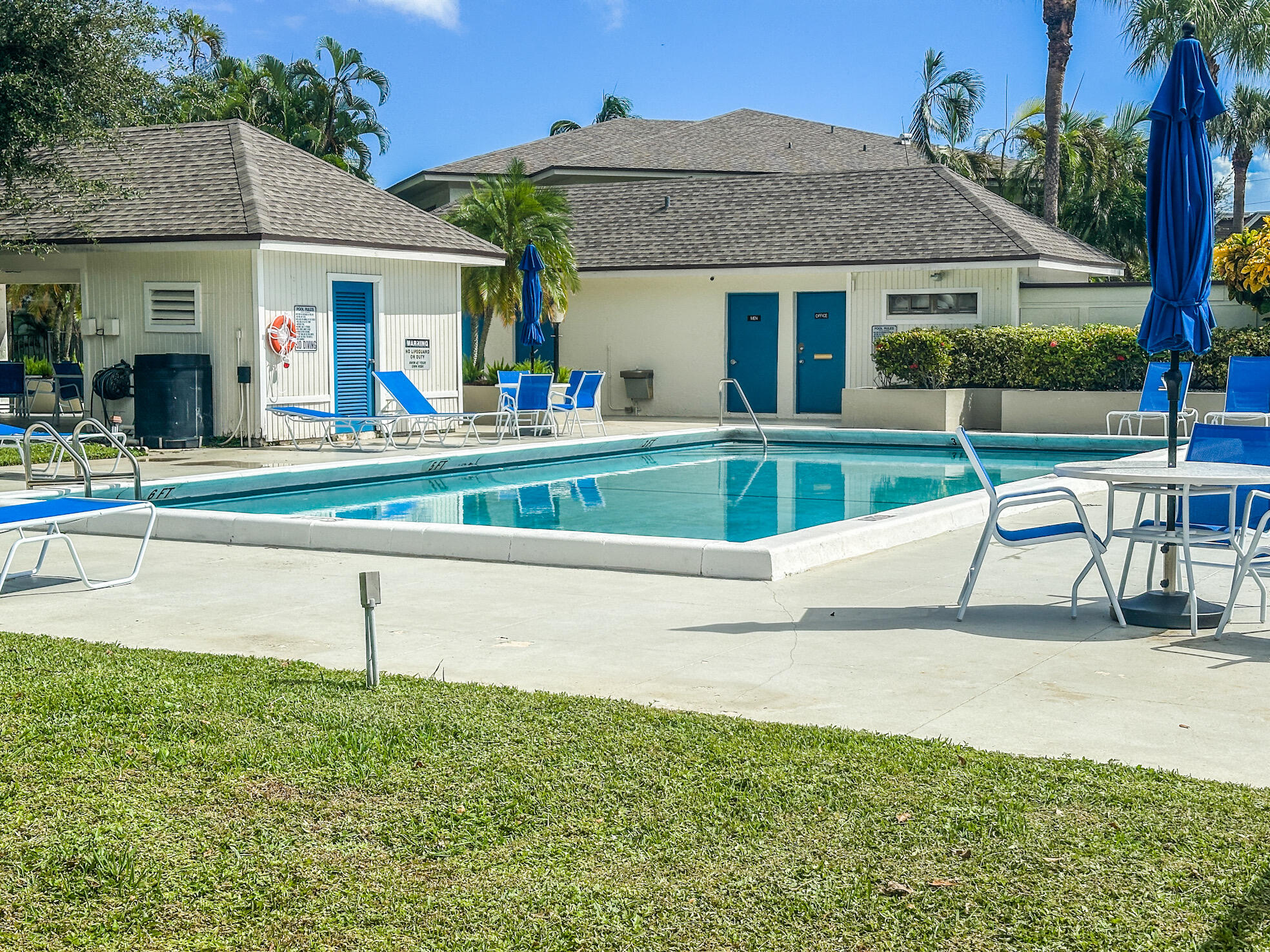 3130 Southwest 20th Terrace, Unit 13B1 Delray Beach, FL 33445 - Photo 37 of 47 a view of an house with backyard and porch