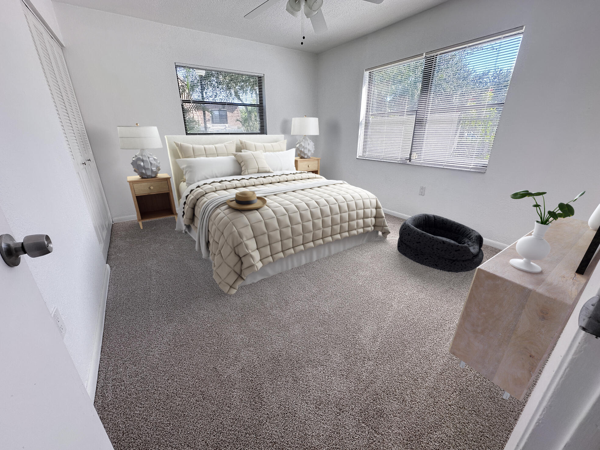 3130 Southwest 20th Terrace, Unit 13B1 Delray Beach, FL 33445 - Photo 43 of 47 a bedroom with a bed and a chandelier