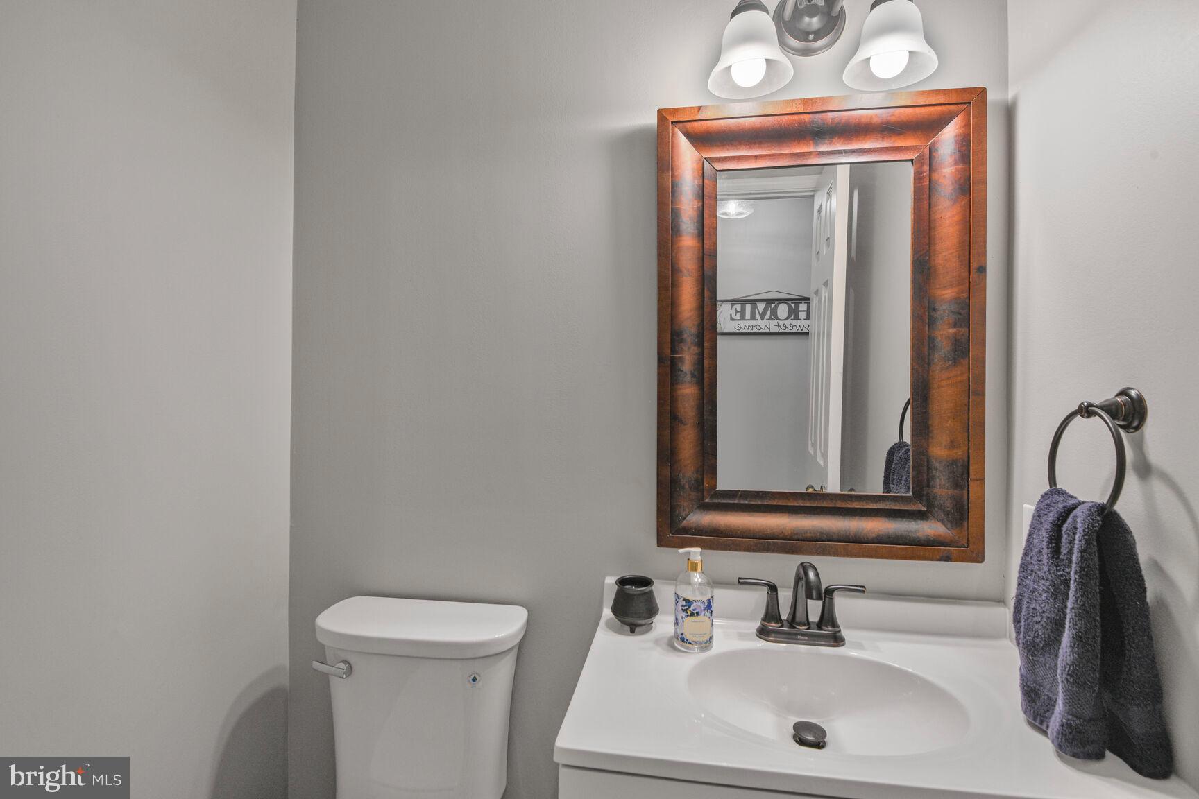 1037 Windmill Lane Silver Spring, MD 20905 - Photo 16 of 54 Powder Room, new commode & vanity