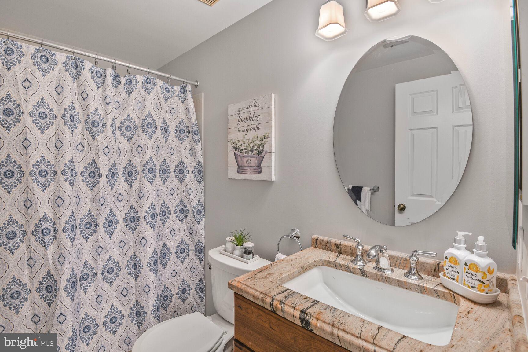 1037 Windmill Lane Silver Spring, MD 20905 - Photo 21 of 54 Large Hall Bathroom