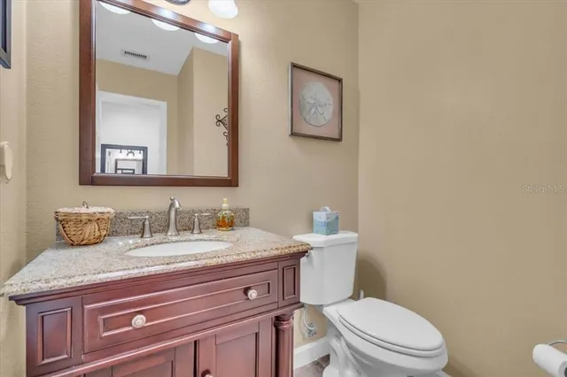 a work room with furniture and a window