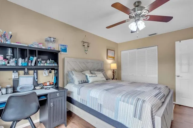 a bed room with a bed and a window