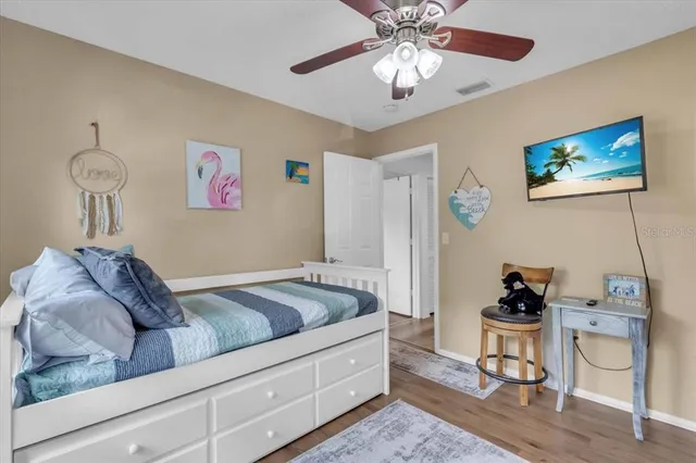 a view of a house with a backyard porch and sitting area