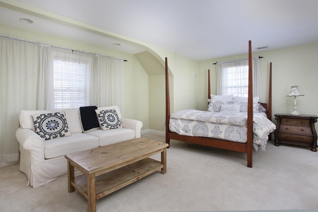 24 Arlington Road Brookline, MA 02467 - Photo 12 of 25 a bedroom with bed and a couch