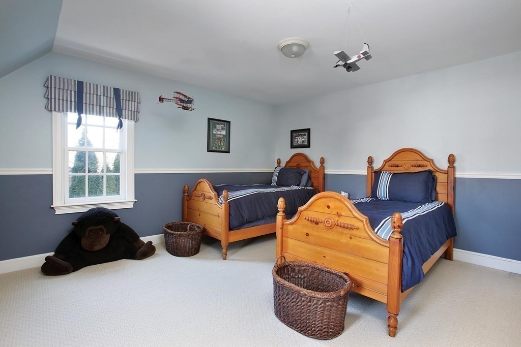 24 Arlington Road Brookline, MA 02467 - Photo 18 of 25 a living room with furniture and a window