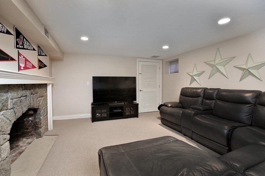 24 Arlington Road Brookline, MA 02467 - Photo 20 of 25 a living room with furniture and a flat screen tv
