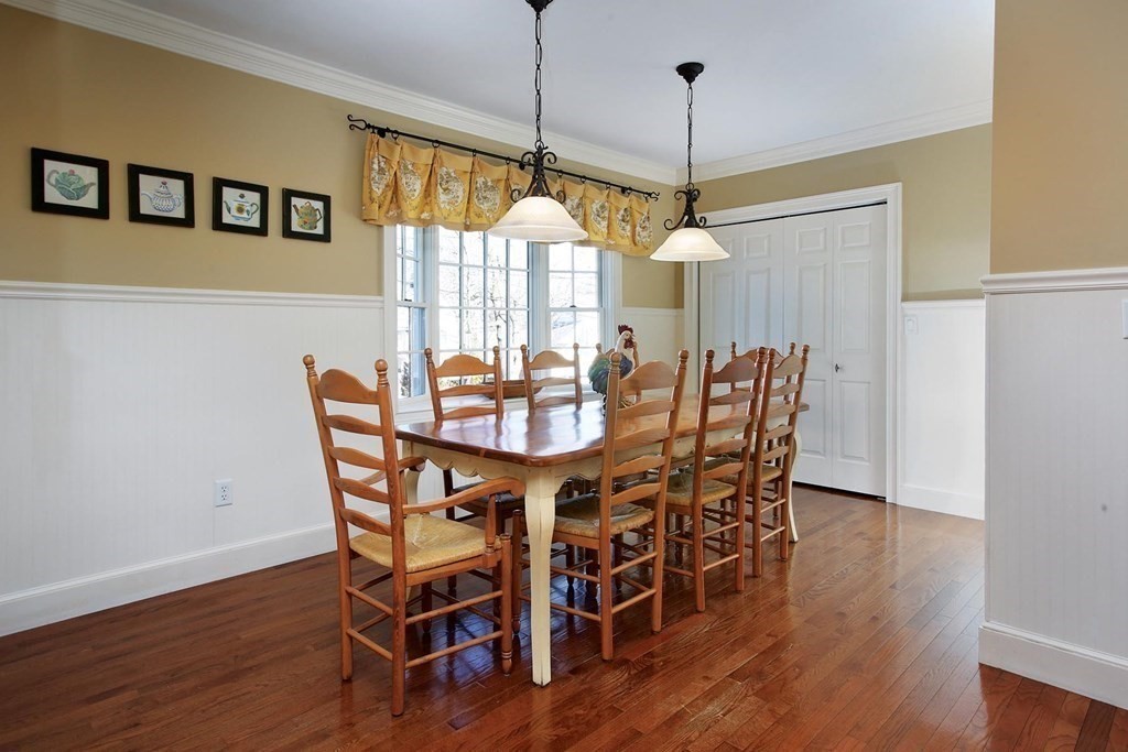 24 Arlington Road Brookline, MA 02467 - Photo 8 of 25 a dining room with furniture window wooden floor