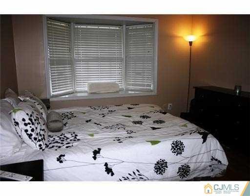 1115 Edpas Road New Brunswick, NJ 08901 - Photo 5 of 8 a view of a bedroom