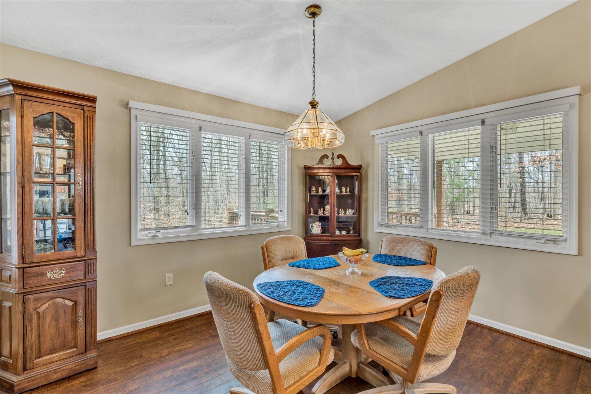 95 Echowood Lane Hardy, VA 24101 - Photo 11 of 46 a view of a dining room with furniture window and wooden floor