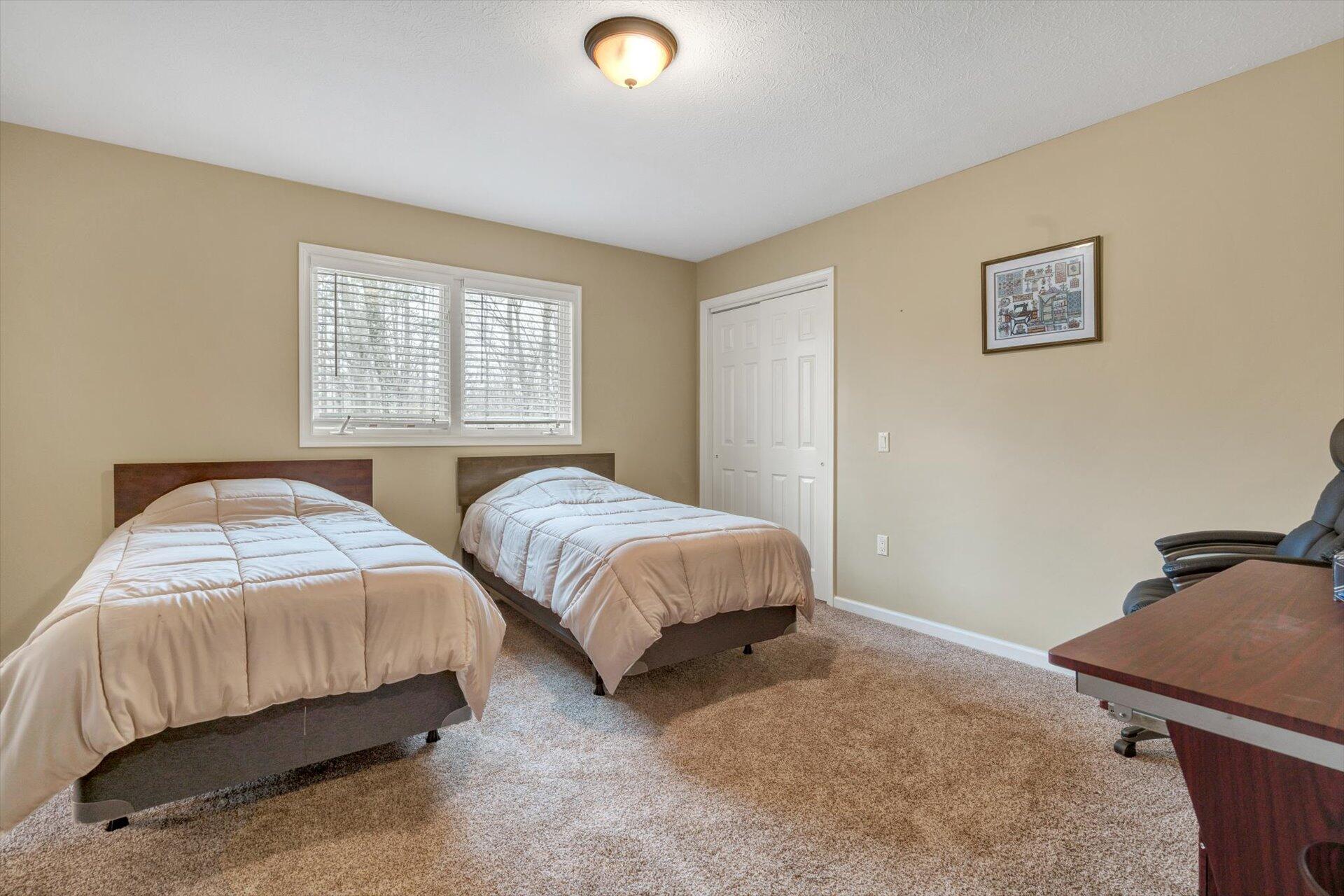 95 Echowood Lane Hardy, VA 24101 - Photo 21 of 46 a bedroom with two beds and painted walls