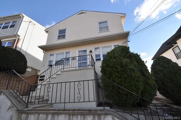 a view of a house with a deck