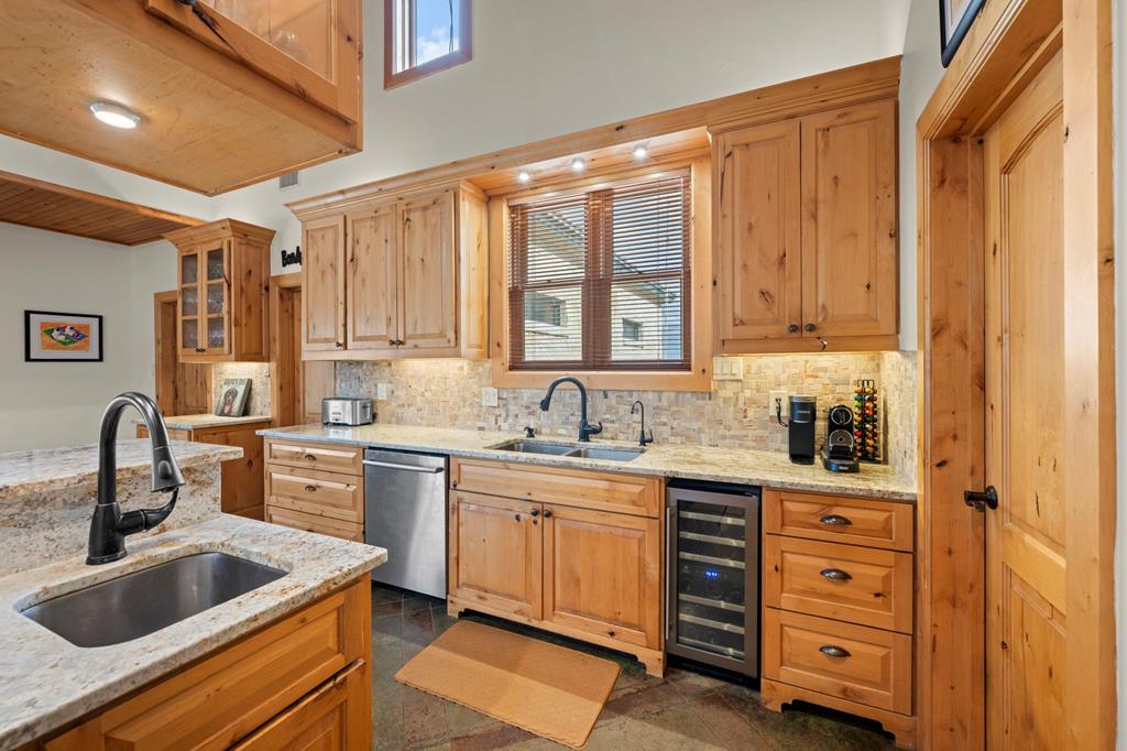2320 Fiedler Road Harper, TX 78631 - Photo 16 of 62 a kitchen with granite countertop a sink stainless steel appliances and cabinets