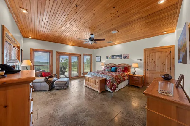 a bathroom with a mirror and a shower